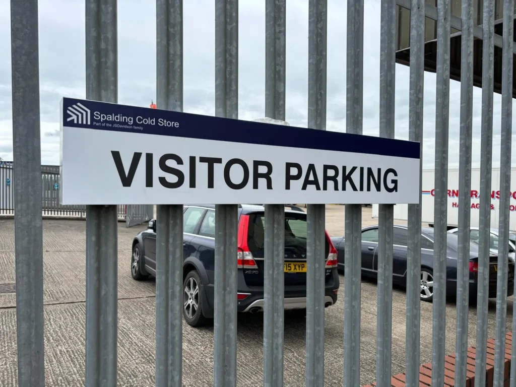 Branded visitor parking sign at Spalding Cold Store
